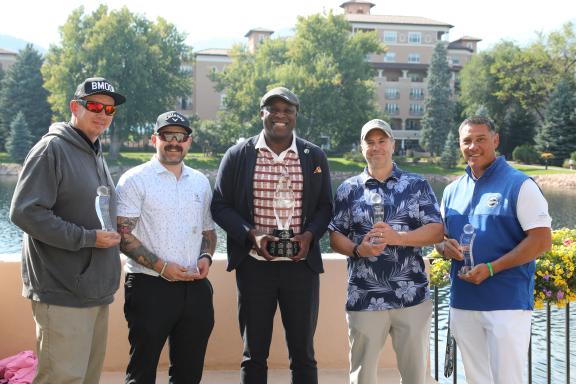 Mayor Yemi takes a photo with the 2024 Mayor's Cup winners