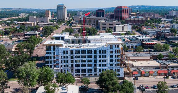 The construction of an apartment complex in Downtown Colorado Springs